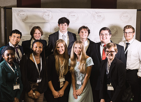 Pi Tau Sigma students at a conference
